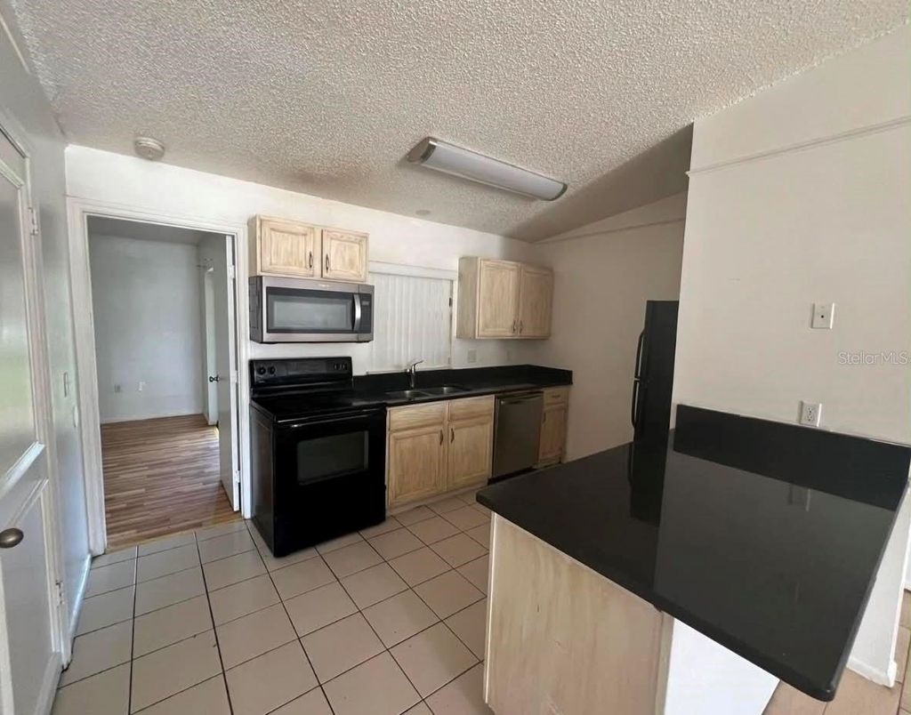 Photo of 1109 Woodman Way, Orlando, FL 32818 (MLS # S5149919)
