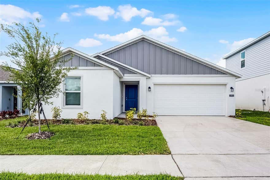 Welcome to this spacious, modern 4-bedroom, 2-bathroom one-story home in the sought-after Peace Creek Reserve community! Perfectly positioned near Hwy 27, this prime location offers quick access to Legoland, Downtown Winter Haven & Lake Wales, shopping, dining, and the stunning Chain of Lakes—ideal for boating, fishing, and outdoor adventures. Step inside and spoil yourself with the upscale Bloom floor plan, designed for effortless living and entertaining. The open-concept layout features a gorgeous kitchen with a center island, solid surface countertops, and brand-new stainless steel appliances, seamlessly flowing into a cozy café space and a bright, airy family room. Host gatherings with ease or unwind in your private owner’s suite, complete with a serene bedroom, a spa-like bathroom, and a roomy walk-in closet. Three additional bedrooms and a sleek second bathroom provide ample space for family or guests. Everything is included – from the oversized tile flooring in wet areas to the low-maintenance finishes that blend style and practicality. Step outside to your huge backyard, a blank canvas for gardening, play, or future upgrades. Peace Creek Reserve has a tranquil, nature-inspired lifestyle with amenities like a resort-style pool, playground, and scenic walking trails along a peaceful creek. Enjoy the charm of a safe, tight-knit community with the convenience of city living. Winter Haven’s bike paths, lakeside parks, and vibrant downtown ensure there’s always something to explore. This home combines modern luxury with small-town warmth. Don’t miss your chance to live in one of Winter Haven’s most desirable neighborhoods.