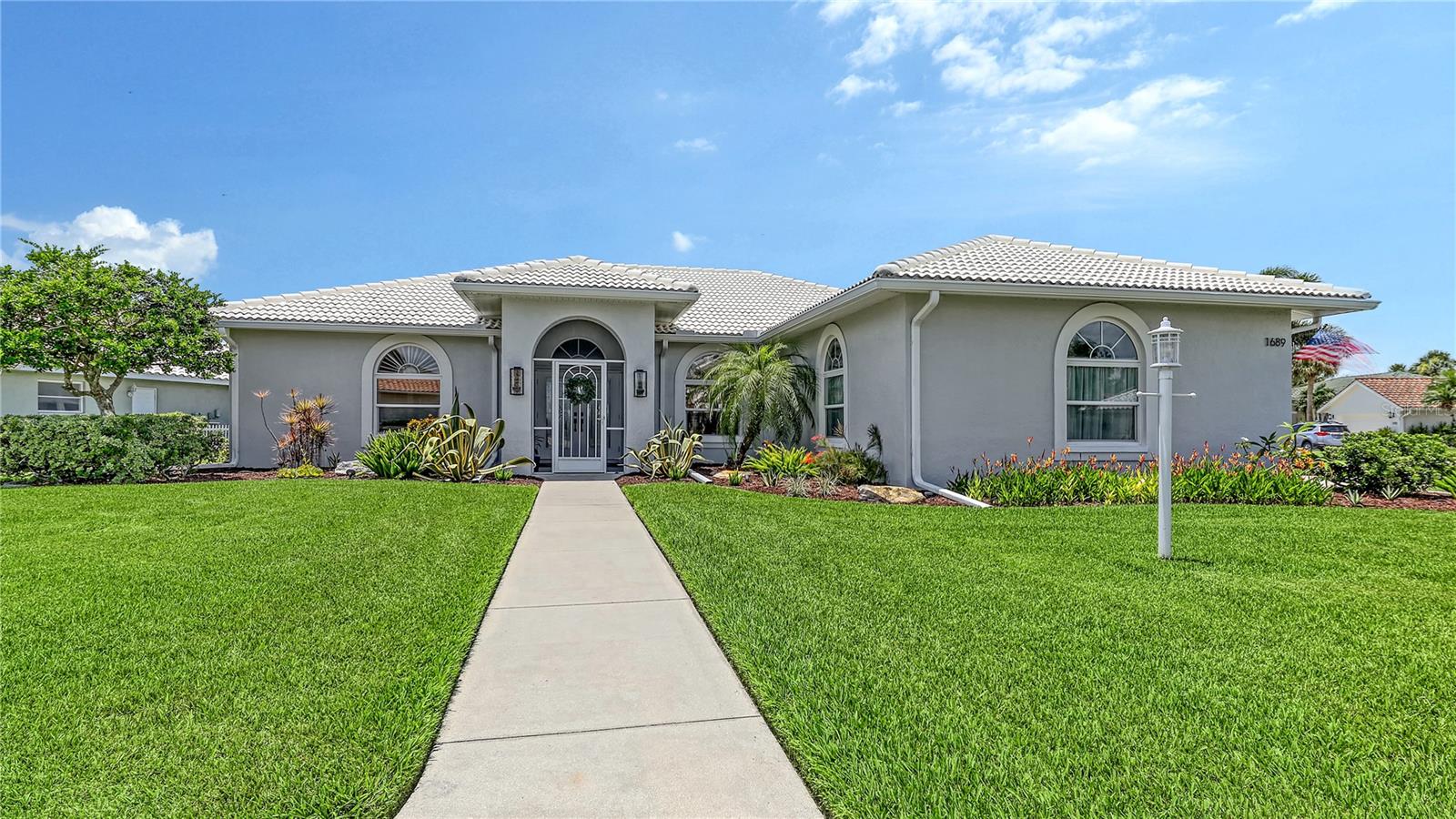 Welcome to 1689 Valley Drive—a stylish and fully updated 3-bedroom, 2-bath home in one of Venice’s favorite gated communities. Set on a peaceful lakefront lot, this home offers water views, a private pool, and a layout that’s both functional and beautiful.
Inside, you’ll find a bright, open floor plan with high ceilings, neutral colors, and lots of natural light. The kitchen features white shaker cabinets, quartz countertops, stainless appliances, a large island, and gorgeous pendant lighting—perfect for casual meals or entertaining guests.
The custom-designed office space is a standout with tons of natural light, and a quiet setting that makes working from home a pleasure.
Step outside to your own private retreat with paver patio, a heated, salt water screened-in pool, covered lanai, and lake views—great for relaxing, dining al fresco, or enjoying the Florida sunshine.
Everything in this home has been tastefully updated, so it’s completely move-in ready. Community heated pool and spa, fitness room, clubhouse and tennis courts. Optional golf memberships available! And with easy access to beaches, golf, restaurants, and shopping, the location couldn’t be better.
If you’re looking for a meticulously maintained lakefront pool home in a secure, friendly neighborhood—this is it!