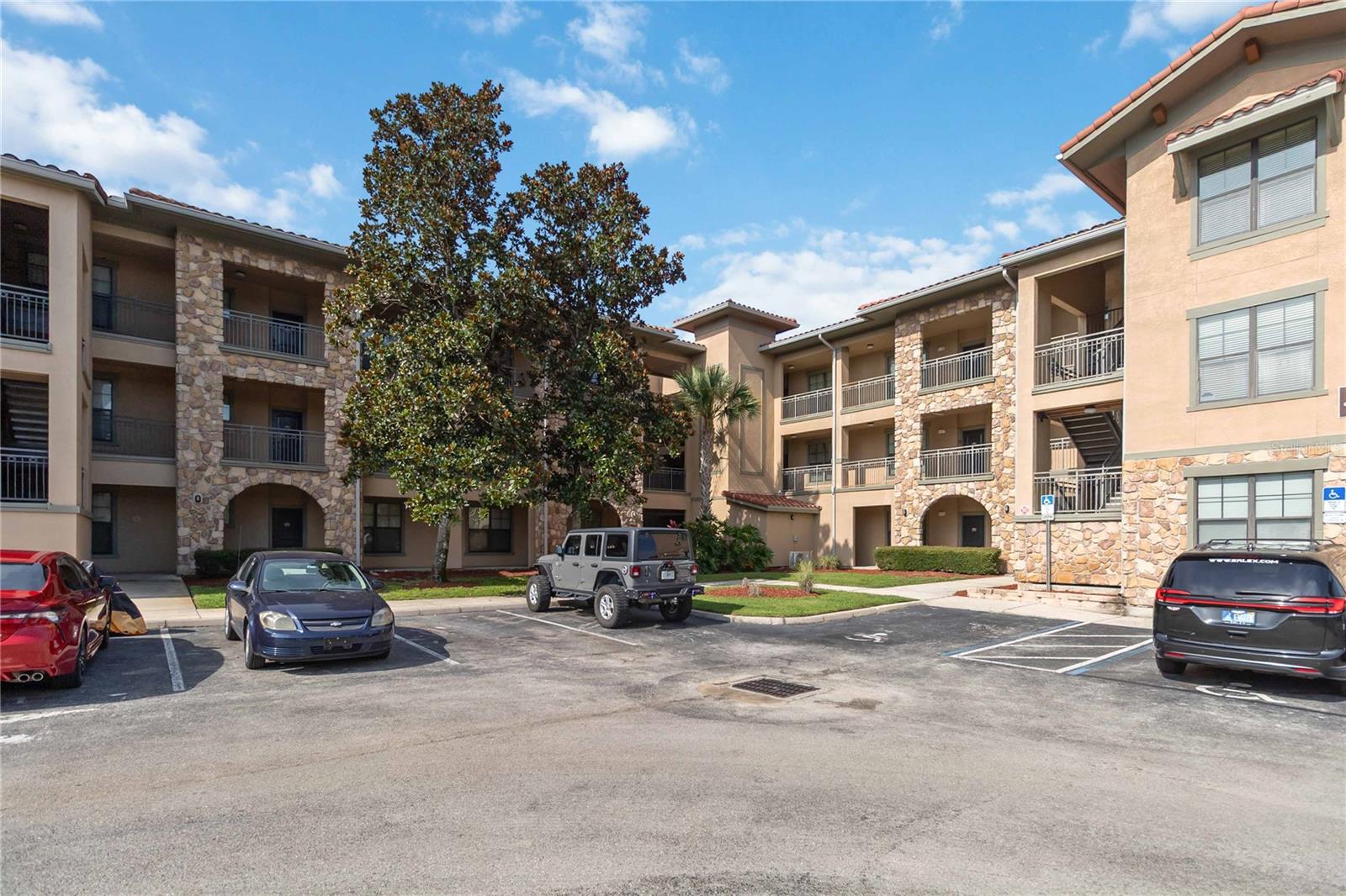 Unit is vacant. Furnished corner unit with pool view and vaulted ceilings. Short-term and long-term rentals permitted - great for investors or primary use. HOA includes cable, internet, and access to community amenities. Building has elevator. Located just off Hwy 27 with easy access to theme parks, shopping, and dining. Buyer/agent to verify room measurements, leasing restrictions, and HOA details. Seller is foreign so FRPTA will apply.