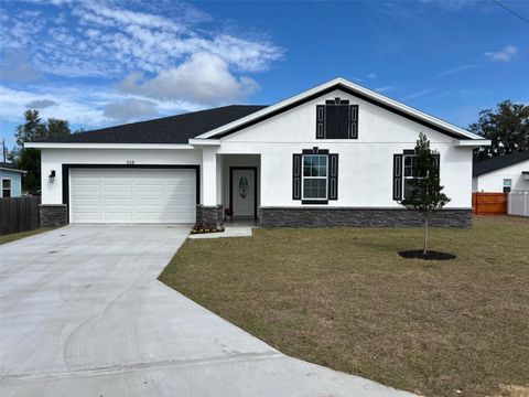 Photo of 310 Gibson Avenue, Lake Wales, FL 33853 (MLS # S5144843)