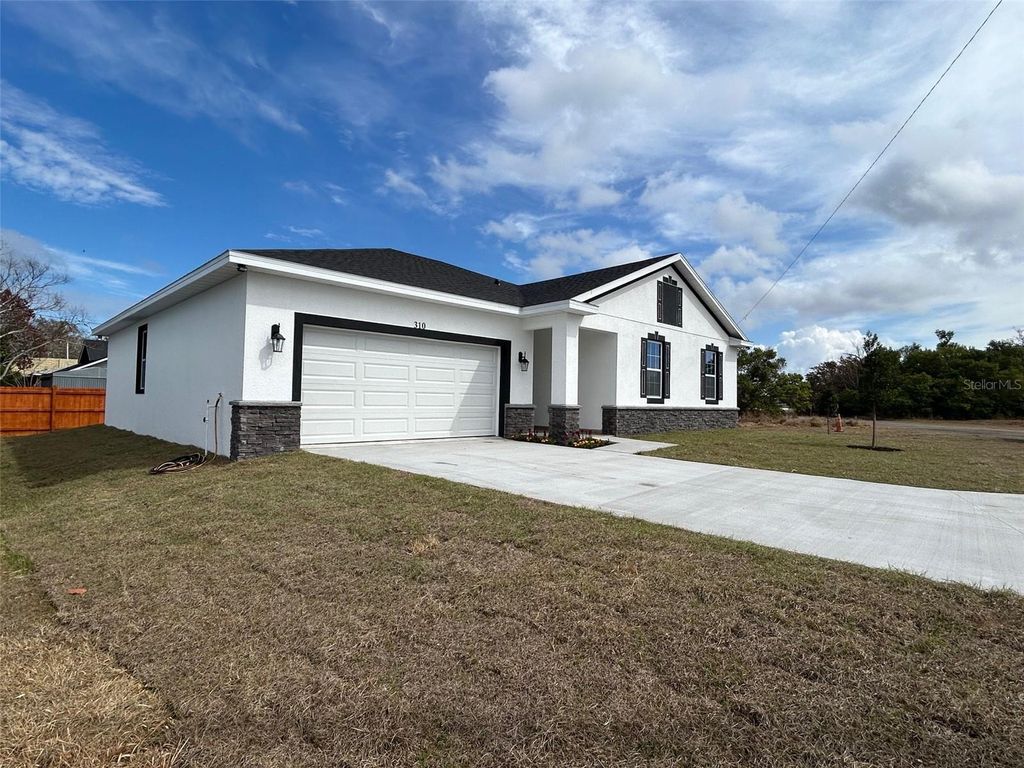 Photo of 310 Gibson Avenue, Lake Wales, FL 33853 (MLS # S5144843)