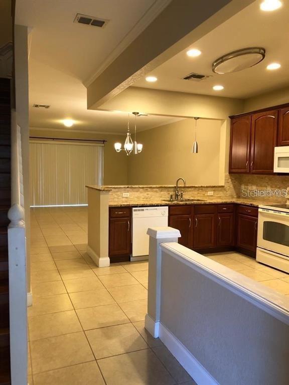 Photo of 2850 Polvadero Lane #105, Orlando, FL 32835 (MLS # O6452376)