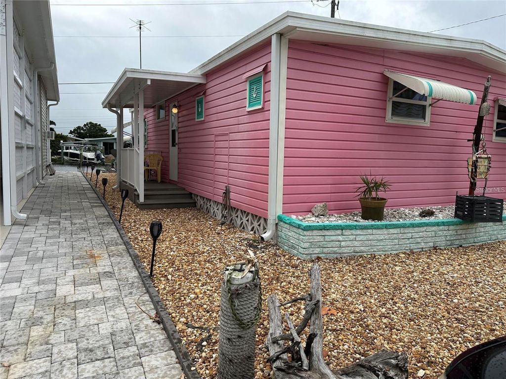 Photo of 310 Bahama Drive, Palmetto, FL 34221 (MLS # C7501480)