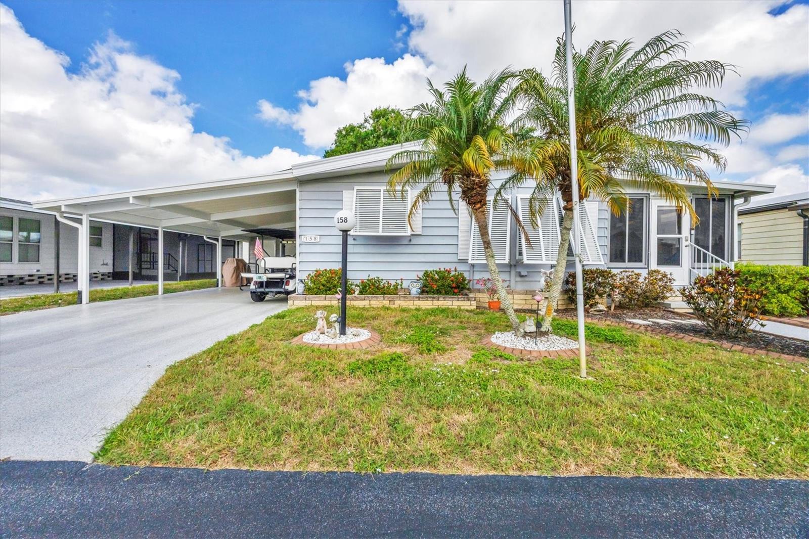 Beautifully Updated Home in the Desirable Gold Tree 55+ Community! MUST SEE ! NO LOT RENT- SHARE OWNED
Welcome to Lot 158 at 5707 45th Street E, Bradenton—a stunning, move-in-ready home with $60,000+ in upgrades, located in the gated, resort-style Gold Tree Co-Op, an active 55+ community offering convenience, comfort, and peace of mind.
This 2-bedroom, 2-bath home has been thoughtfully renovated from top to bottom. Notable updates include a new roof (2024), fully remodeled bathrooms (2023), New enclosed light-filled sunroom with HVAC (2020)—perfect for year-round enjoyment. The upgrades continue with:
New appliances, Extended carport with epoxy, French drains for improved drainage, New Bahama shades, New windows, Waterproof LVP flooring, Nest thermostat, Piping replaced, Accessible water shut-off valve, New hose bibs and more!
With modern finishes and practical improvements throughout, this home is truly turn-key. The Gold Tree community fee includes cable, internet, lawn maintenance, water, sewer, and trash—giving you hassle-free living with all the extras.
Enjoy access to a wide range of amenities including a clubhouse, pool, fitness center, pickleball, shuffleboard, and more—all just minutes from shopping, dining, medical facilities, and Florida’s world-renowned beaches.
Don’t miss this opportunity—schedule your private showing today and start living the Florida lifestyle you’ve been dreaming of!