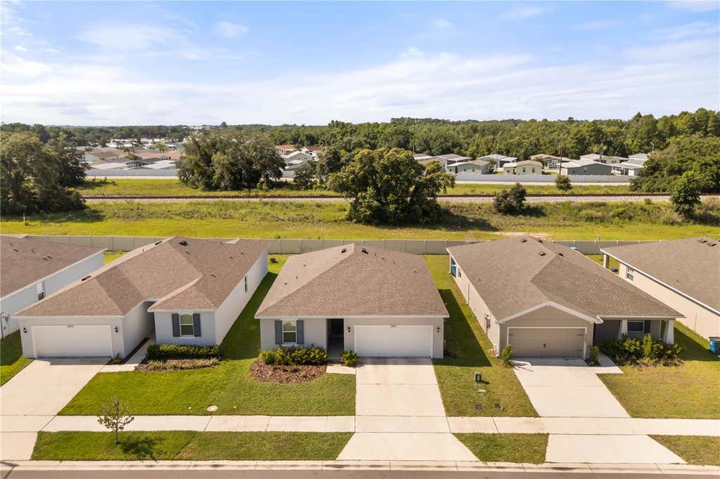 Photo of 5479 Maddie Drive, Haines City, FL 33844 (MLS # O6421701)