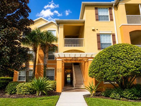 Photo of 6380 Contessa Drive #310, Orlando, FL 32829 (MLS # S5146514)