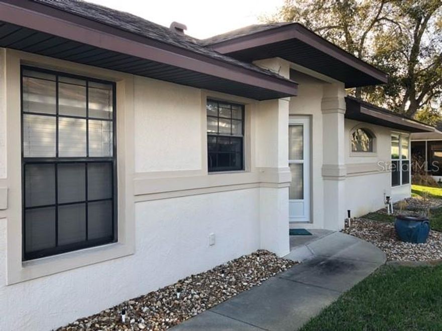 TURNKEY & MOVE-IN READY. PROFESSIONAL MEDIA COMING SOON. This WELL-MAINTAINED, CBS 2/2 plus flex room home is waiting for your personal touches.  The LIVING and DINING ROOM COMBO is the center of the home, and there is a split bedroom floorplan.  Recent updates include:  BEAUTIFULLY RENOVATED KITCHEN with STONE COUNTERS, 42" CABINETS and STAINLESS STEEL APPLIANCES, LUXURY VINYL FLOOR has an EAT-IN SPACE and a CONVENIENT LAYOUT for cooking.  The SPLIT BEDROOM floorplan lends privacy to all.  The PRIMARY BEDROOM has a WALK-IN CLOSET and an UPDATED EN SUITE.  Between the two bedrooms is a BONUS ROOM that can be used for a DEN, TV ROOM, OFFICE or GUEST OVERFLOW.  The LANAI is newly renovated and has with SLIDING VERTICAL WINDOWS all around.  The 2-car garage has pull-down access to the ATTIC for EXTRA STORAGE, PEGBOARD ALL AROUND, a window.  ROOF REPLACED 2018. This cozy 2+/2 offers LOTS OF VALUE and is PRICED TO SELL with a chance to MAKE IT YOUR OWN. Items in garage and lanai furniture do NOT CONVEY. This is your opportunity to OWN A HOME in the premier GOLF COURSE, 55-plus community of ROYAL HIGHLANDS where residents enjoy a full range of amenities, including CABLE & HIGH-SPEED, FIBER OPTIC INTERNET, a GATED entrance with attendants, a GOLF COURSE, a RESTAURANT, tennis, pickleball, softball, INDOOR & OUTDOOR POOLS, secured RV STORAGE, bocce, shuffleboard, a FITNESS ROOM, a library, arts and crafts, billiards, catch-and-release fishing, and a variety of clubs. There truly is SOMETHING FOR EVERYONE in this vibrant community!