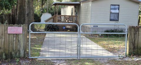 Photo of 1311 NW 18th Avenue, Chiefland, FL 32626 (MLS # GC538095)