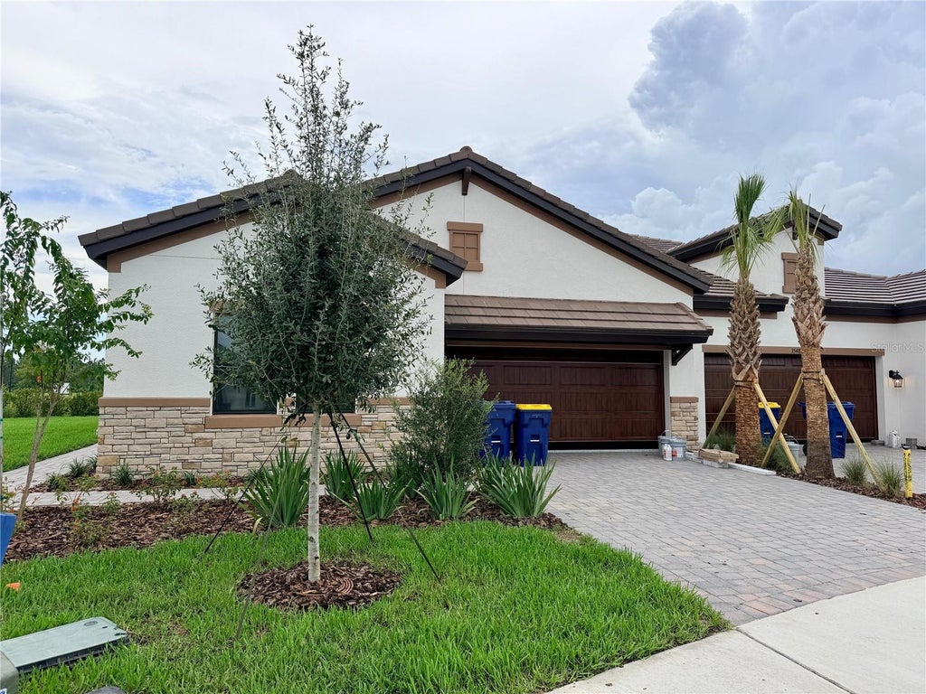 Photo of 35486 Stableton Ln, Zephyrhills, FL 33541 (MLS # J1004611)