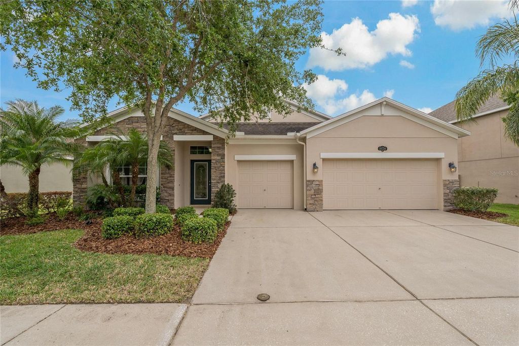 Photo of 10734 Breaking Rocks Drive, Tampa, FL 33647 (MLS # TB8369421)