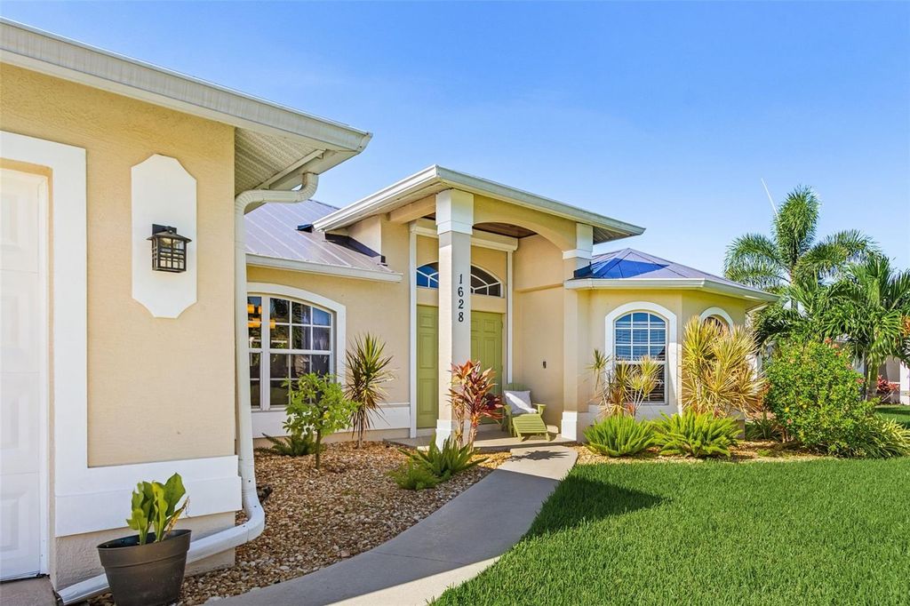 Photo of 1628 SW 44th Terrace, Cape Coral, FL 33914 (MLS # C7514023)