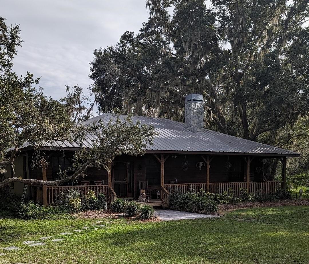 Beautiful 31 acres located on the manatee river in myakka. From the time you drive in you will be hooked. The beautiful 3bed 2 bath block home with the cedar siding looks like a peaceful cabin in the woods. The home is nestled between large oaks. Sitting inside near the fireplace or outside on the front porch you can see the green open pastures with the lovely cattle grazing. Sitting in the dinning room or out on the rear porch next to the pool you can watch the wildlife rustling about. Sometimes its squirrels and other times it might be deer and turkeys. Put in a canoe or john boat and fish the river or explore your 2+ acres on the south side. Along the south west side (in the woods) there is a small historical cemetery (Stewart Family Cemetery) that can only be visited by appointment with the homeowner.