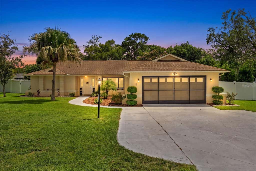 Photo of 11201 Rainbow Woods Loop, Spring Hill, FL 34609 (MLS # W7888473)