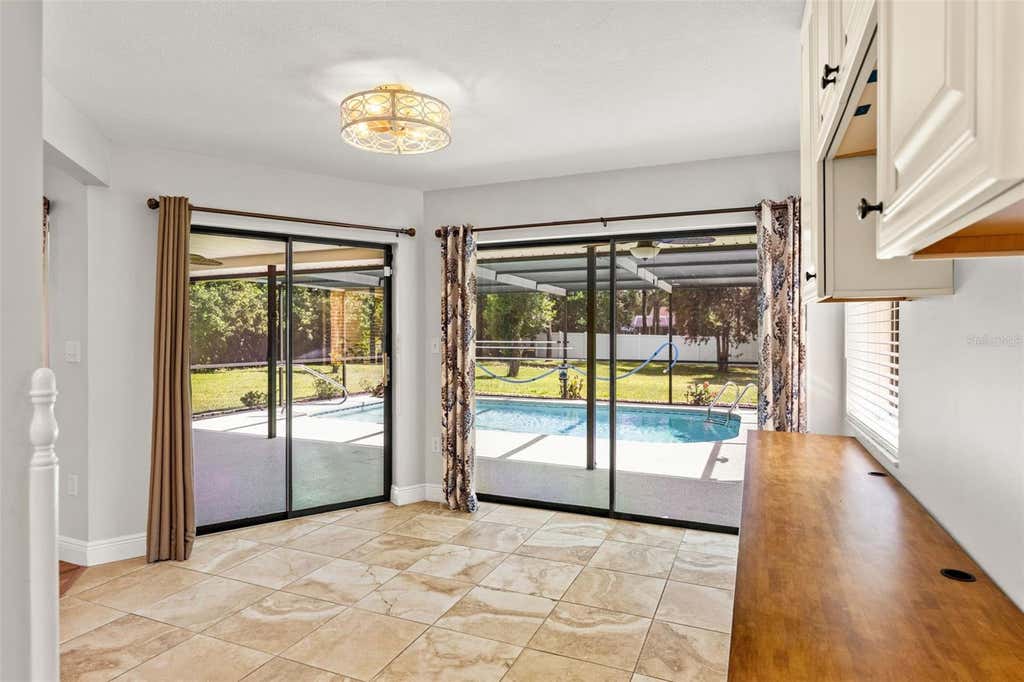 Photo of 11201 Rainbow Woods Loop, Spring Hill, FL 34609 (MLS # W7888473)