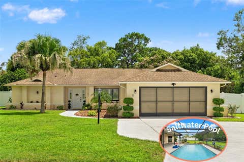 Photo of 11201 Rainbow Woods Loop, Spring Hill, FL 34609 (MLS # W7888473)
