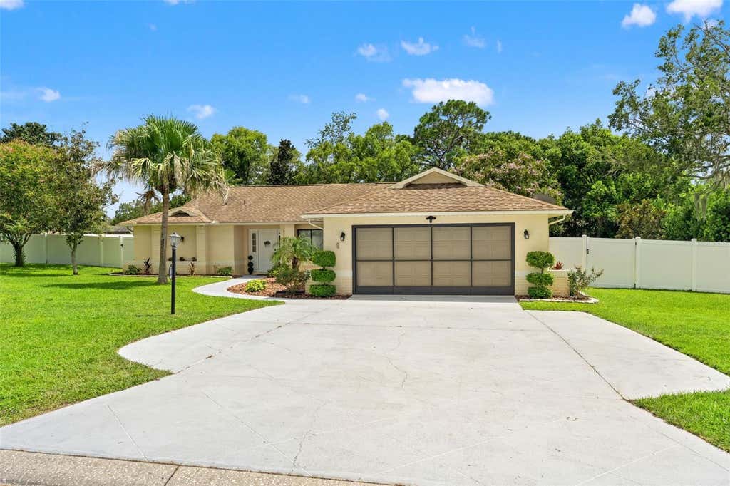 Photo of 11201 Rainbow Woods Loop, Spring Hill, FL 34609 (MLS # W7888473)