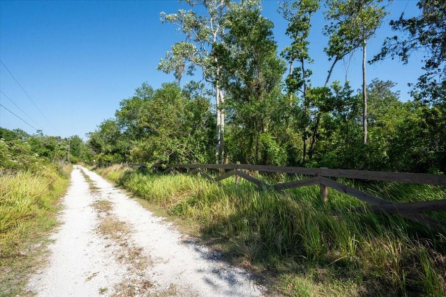 Discover the perfect blend of privacy and convenience with this 6.4-acre parcel, located just minutes from town. Fully fenced and all upland, this property offers a solid foundation for your dream home, farm, or future investment. The land is partially cleared for easy access, while mature trees provide natural beauty and shade. Electric is available at the property line, making development even easier. Whether you’re looking for space to spread out or a smart investment opportunity, this versatile property checks all the boxes.
No HOA, no CDD – just wide-open potential.