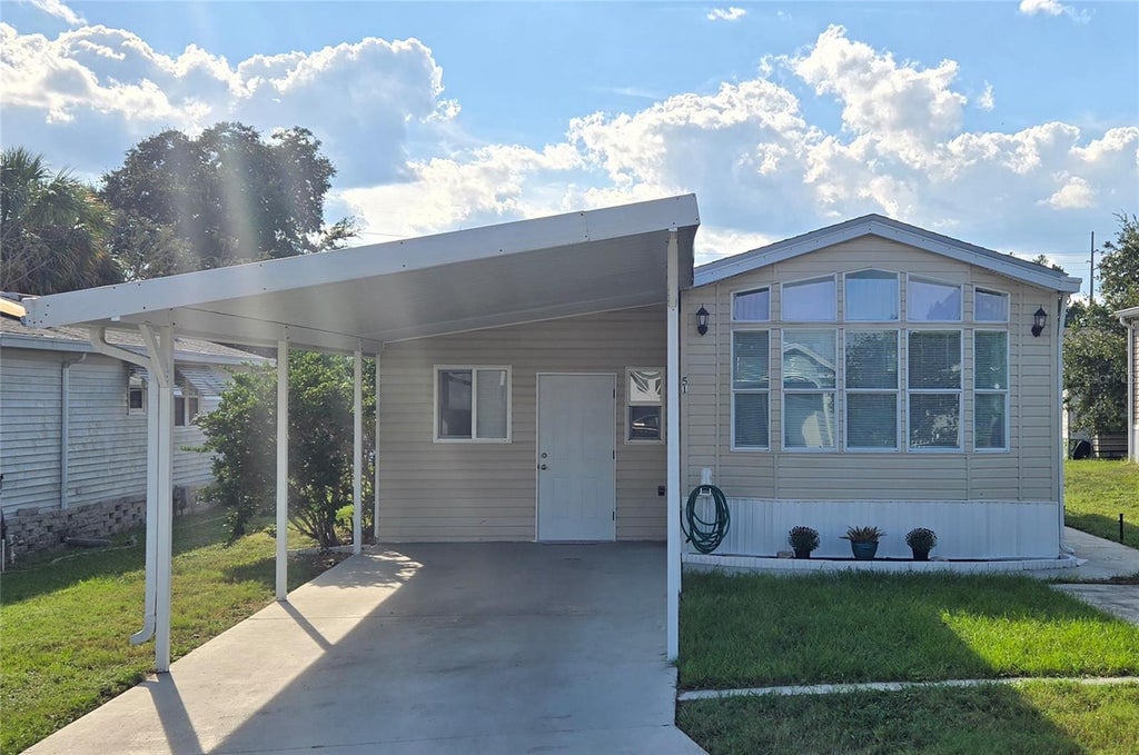 Photo of 50989 Highway 27 #51, Davenport, FL 33897 (MLS # S5158614)