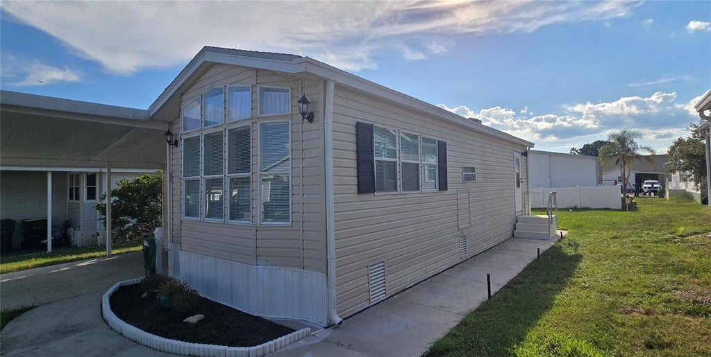Photo of 50989 Highway 27 #51, Davenport, FL 33897 (MLS # S5158614)