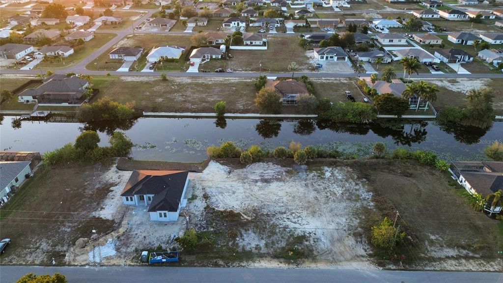 Photo of 1314 NE 6th Avenue, Cape Coral, FL 33909 (MLS # O6393733)