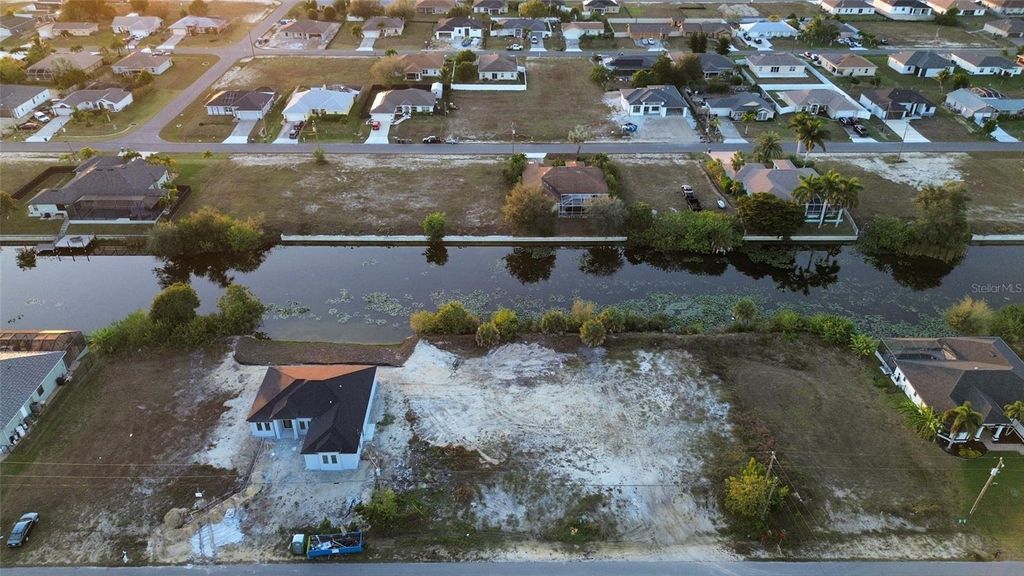 Photo of 1314 NE 6th Avenue, Cape Coral, FL 33909 (MLS # O6393733)