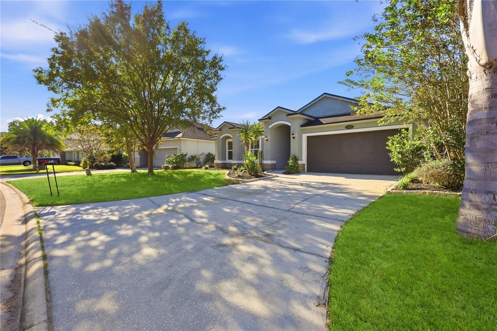 Photo of 466 W New England Drive, Elkton, FL 32033 (MLS # O6452343)