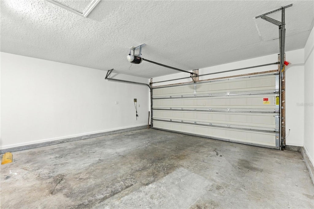 Photo of 466 W New England Drive, Elkton, FL 32033 (MLS # O6452343)