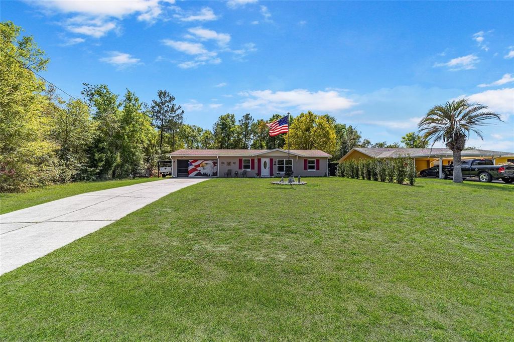 Photo of 10242 N Deltona Boulevard, Citrus Springs, FL 34434 (MLS # OM721393)