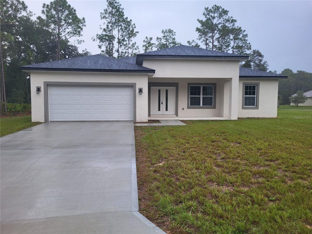 Photo of 646 W Homeway Loop, Citrus Springs, FL 34434 (MLS # TB8434479)