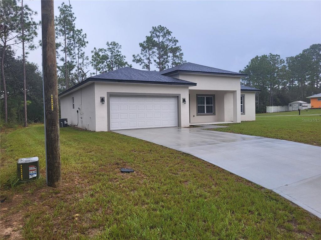 Photo of 646 W Homeway Loop, Citrus Springs, FL 34434 (MLS # TB8434479)