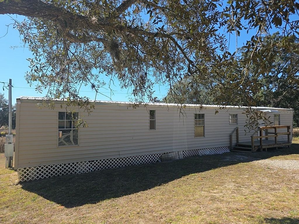 Photo of 1390 W Noble Street, Lecanto, FL 34461 (MLS # TB8451978)