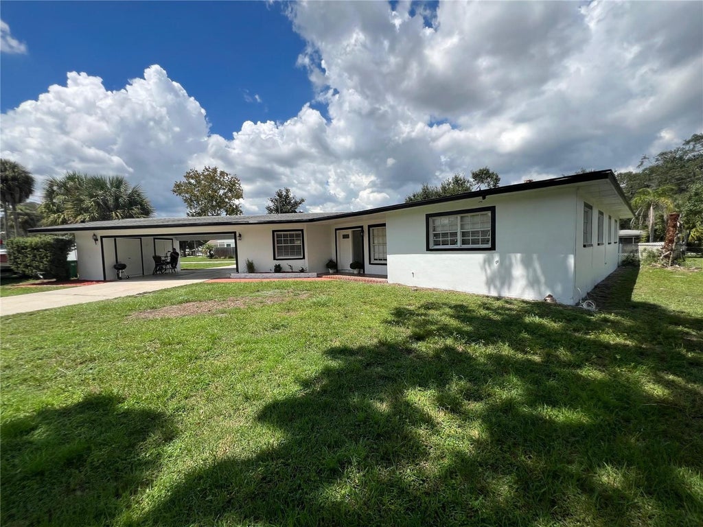 Photo of 10909 W Elbow Drive, Tampa, FL 33612 (MLS # TB8546138)