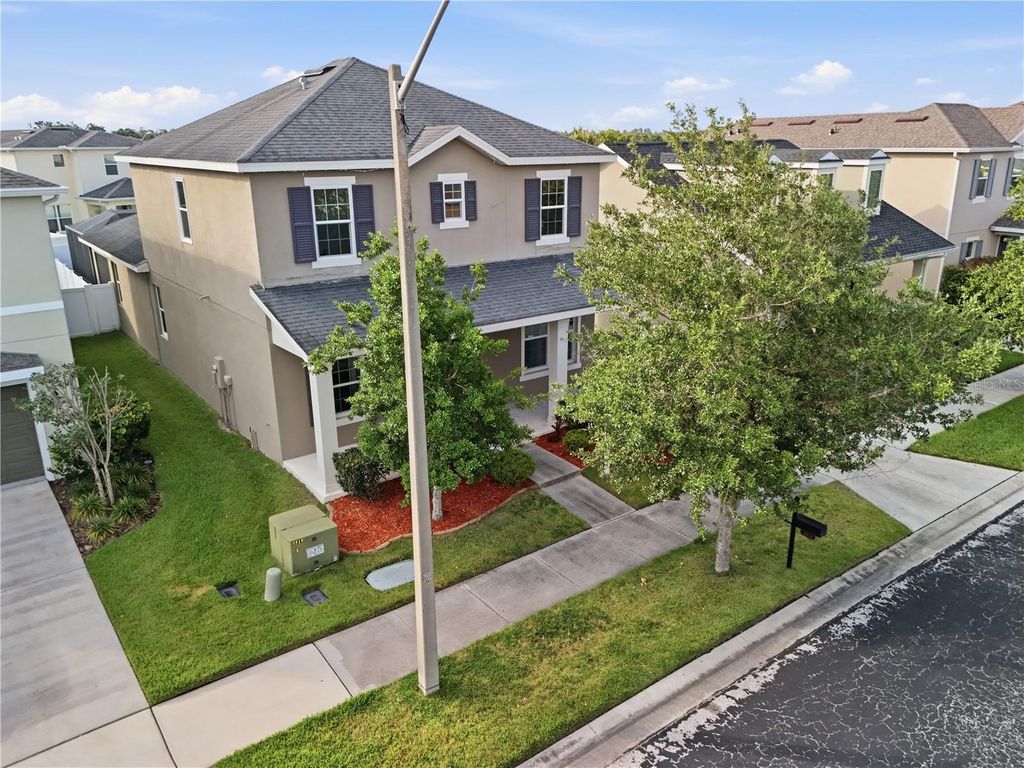 Photo of 32659 Harmony Oaks Drive, Wesley Chapel, FL 33545 (MLS # TB8512949)