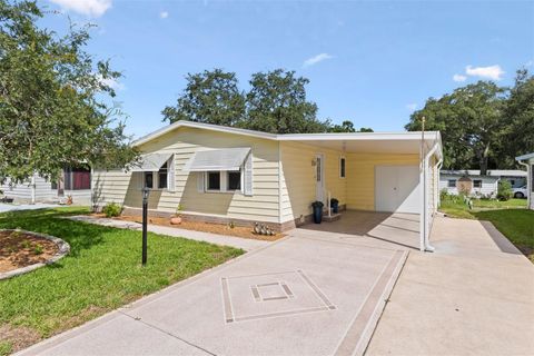 Photo of 1726 Hilton Head Boulevard, Lady Lake, FL 32159 (MLS # G5114051)