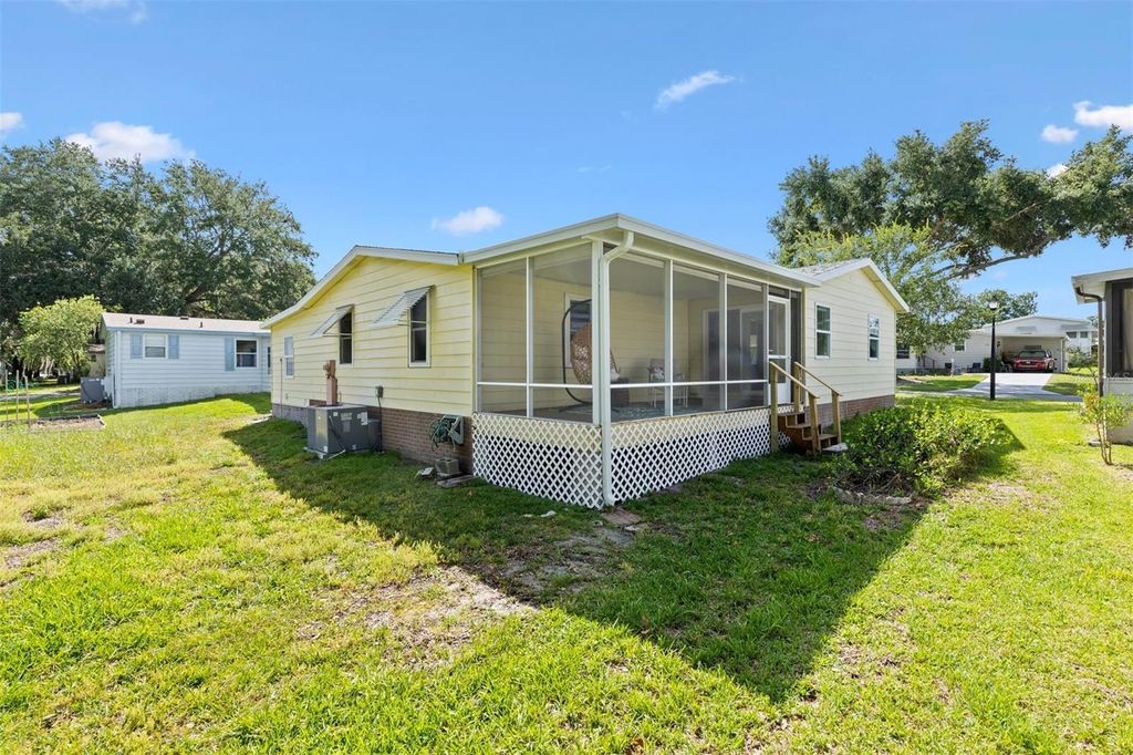 Photo of 1726 Hilton Head Boulevard, Lady Lake, FL 32159 (MLS # G5114051)