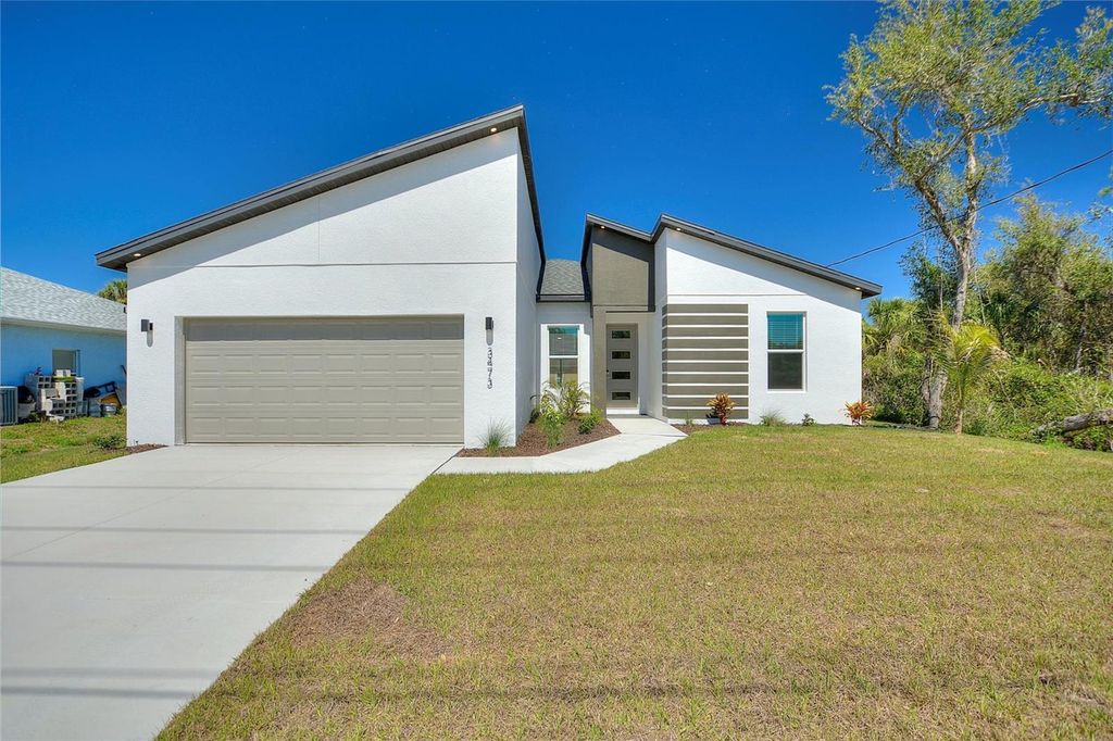 Photo of 3473 S San Mateo Drive, North Port, FL 34288 (MLS # O6299337)