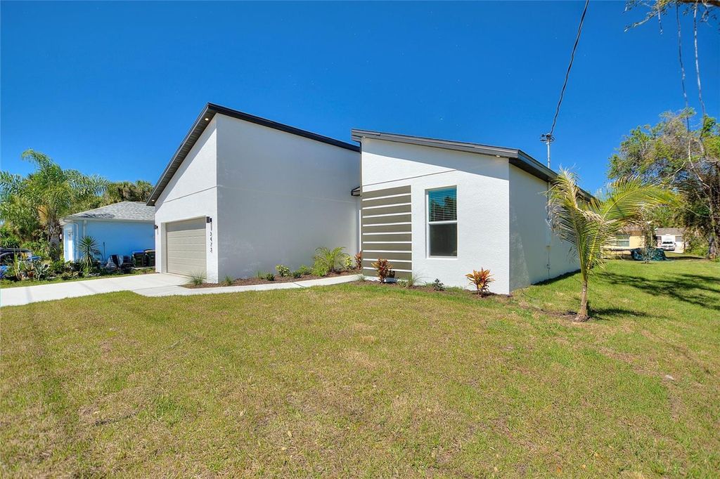 Photo of 3473 S San Mateo Drive, North Port, FL 34288 (MLS # O6299337)