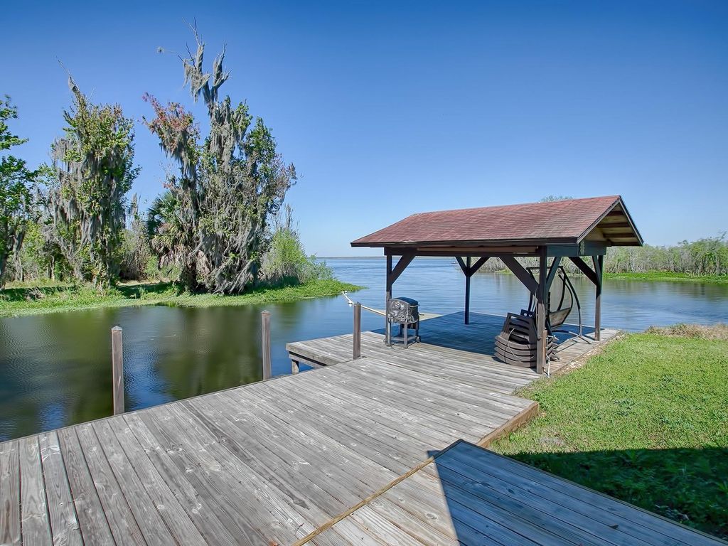 Photo of 426 NW 5th Road, Lake Panasoffkee, FL 33538 (MLS # OM712713)