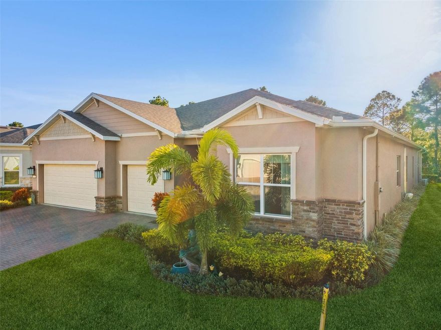 Experience the pinnacle of elegance in this Renown floor plan, the largest single-story home in the community due to the addition of the great room, designed for those who appreciate fine living and effortless entertaining. With three spacious bedrooms, each featuring its own en-suite bath, and a grand den with coffered ceilings, a cozy fireplace and conservation views from the large picture windows, every detail of this home exudes sophistication and comfort.
At the heart of this residence lies its most captivating feature, a custom, climate-controlled walk-in wine cellar. Perfect for the collector or entertainer, this showstopping centerpiece blends luxury and function, creating an unforgettable atmosphere for gatherings and quiet indulgence alike.
The open-concept design flows seamlessly through expansive living and dining areas, complemented by a wet and dry bar, gourmet kitchen, and outdoor kitchen—ideal for hosting on any scale. Step outside to your private conservation lot, where glorious sunset views provide a daily backdrop of serenity and style.
Distinctive finishes abound, including custom closets throughout, tray ceilings, crown molding, and a spa-inspired garden tub in the primary bath. The garage features insulated doors and a mini-split system, ensuring year-round comfort, while a whole-house water softener and filtration system enhance everyday luxury. A bonus flex space provides even more versatility for your lifestyle.
Just a short stroll away, the Del Webb Sunbridge amenities center invites you to enjoy resort-style living at its finest—with social clubs, fitness options, and endless activities designed for the 55+ community that values connection and ease.
This home isn’t just built for living it'ss built for entertaining, indulging, and celebrating life beautifully.
Furnishings are optional and several items will convey with the home including all TVs and mounts, beautiful large fountain in front yard and more. 

 As you enter through the guarded gatehouse at Del Webb Sunbridge, you’ll be greeted by lush landscaping, scenic walking trails, and friendly neighbors who make this award-winning 55+ community truly special. Del Webb Sunbridge isn’t just a neighborhood it’s a lifestyle!  Spend your days soaking up the sun in the resort-style, zero-entry pool, joining friends for a game of pickleball or tennis, or unleashing your creativity in one of the community’s many art studios. Enjoy dining and drinks at the on-site tavern, attend live concerts in the 27,000-square-foot clubhouse, or simply unwind with a peaceful walk through nature-filled trails. With daily clubs, activities, and events, you can stay as active or as relaxed as you wish. Even better, yard maintenance and high-speed internet are included, so you can focus on enjoying your best life.  Located just minutes from vibrant Lake Nona, this home in Del Webb Sunbridge combines resort-style living with everyday luxury. With its top-tier amenities, prime location, and immaculate upgrades, this is more than a home, it’s a place to live your dream lifestyle