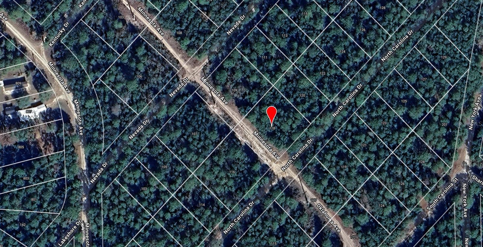 Own your own slice of Florida with this spacious 0.46-acre double lot in the peaceful St. Johns Riverside Estates community of Satsuma. Offering a quiet, wooded setting with no HOA and low annual taxes, this property is ideal for those looking to build a site-built or modular home—or simply secure land for a long-term investment. Located just minutes from the St. Johns River and nearby boat ramps, it’s perfect for nature lovers and outdoor enthusiasts. Whether you build now or later, this parcel gives you the freedom and flexibility to create your own retreat. Buyer to confirm zoning, utility access, and development requirements with Putnam County.