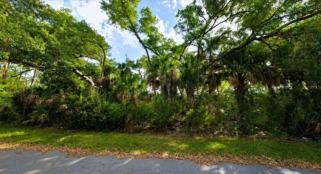 Photo of 1472 Canterbury Lane, Port Charlotte, FL 33953 (MLS # O6417944)