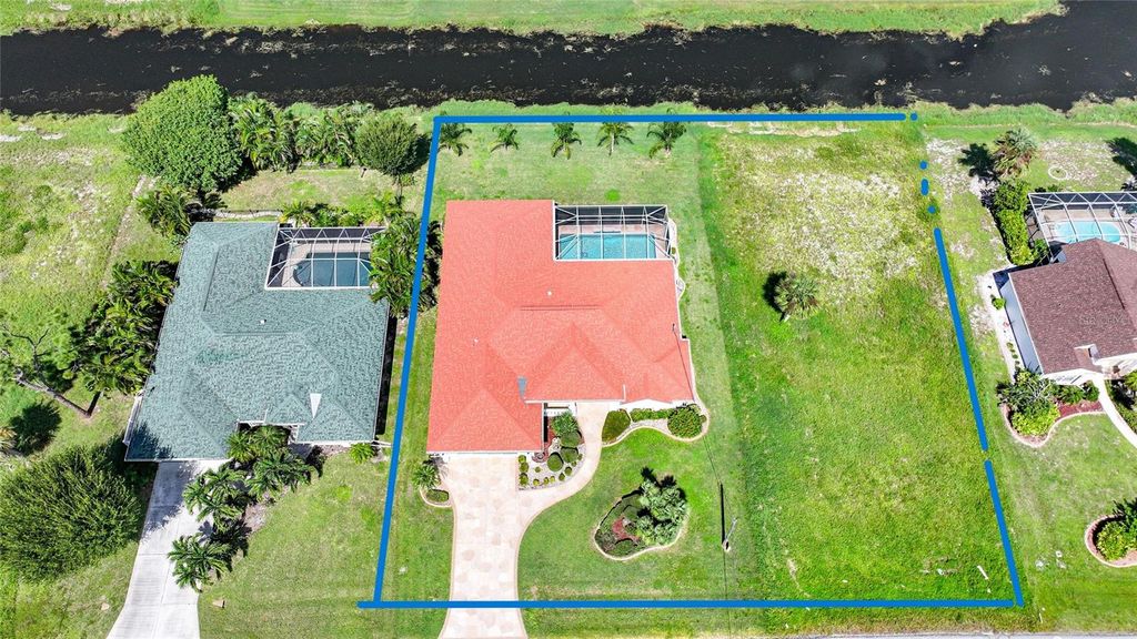 Photo of 264 Broadmoor Lane, Rotonda West, FL 33947 (MLS # D6143757)
