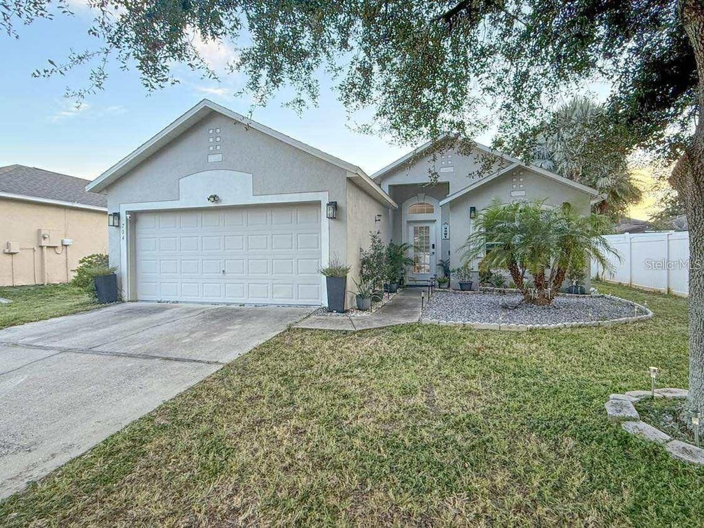 Photo of 704 Flagstone Street, Haines City, FL 33844 (MLS # S5156108)