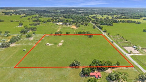 Photo of 1177 NW 102nd Boulevard, Wildwood, FL 34785 (MLS # OM728285)