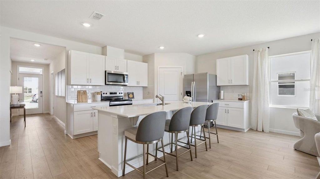 Photo of 4530 Red Fish Run, Kissimmee, FL 34746 (MLS # O6451257)