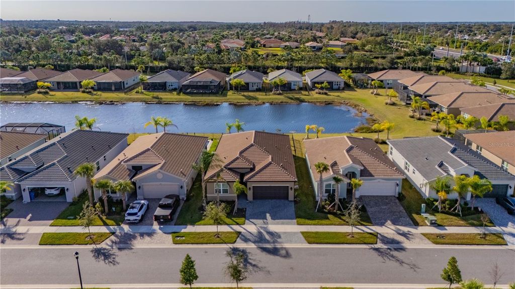 Photo of 4911 Sienna Isles Avenue, Wimauma, FL 33598 (MLS # TB8464610)