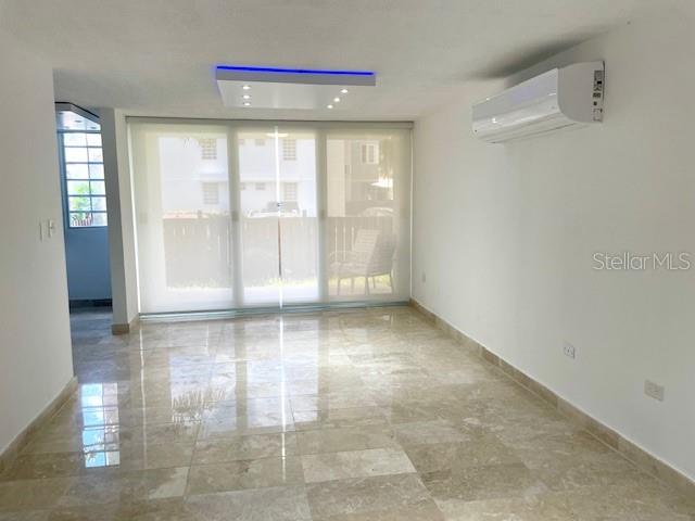Like a house , ground Floor corner apartment with patio and open terrace. Beautiful apartment , completely remodeled with marble floors and equipped with excellent appliances. Ac units in all the bedrooms and dining and living areas . Includes two back to back parking spaces. Building has 24 hours security, pool, tennis court, half basketball court and community room. Walking distance to the Isla Verde Beach , supermarkets , drugstores , restaurants , hotels and easy access to the highway.