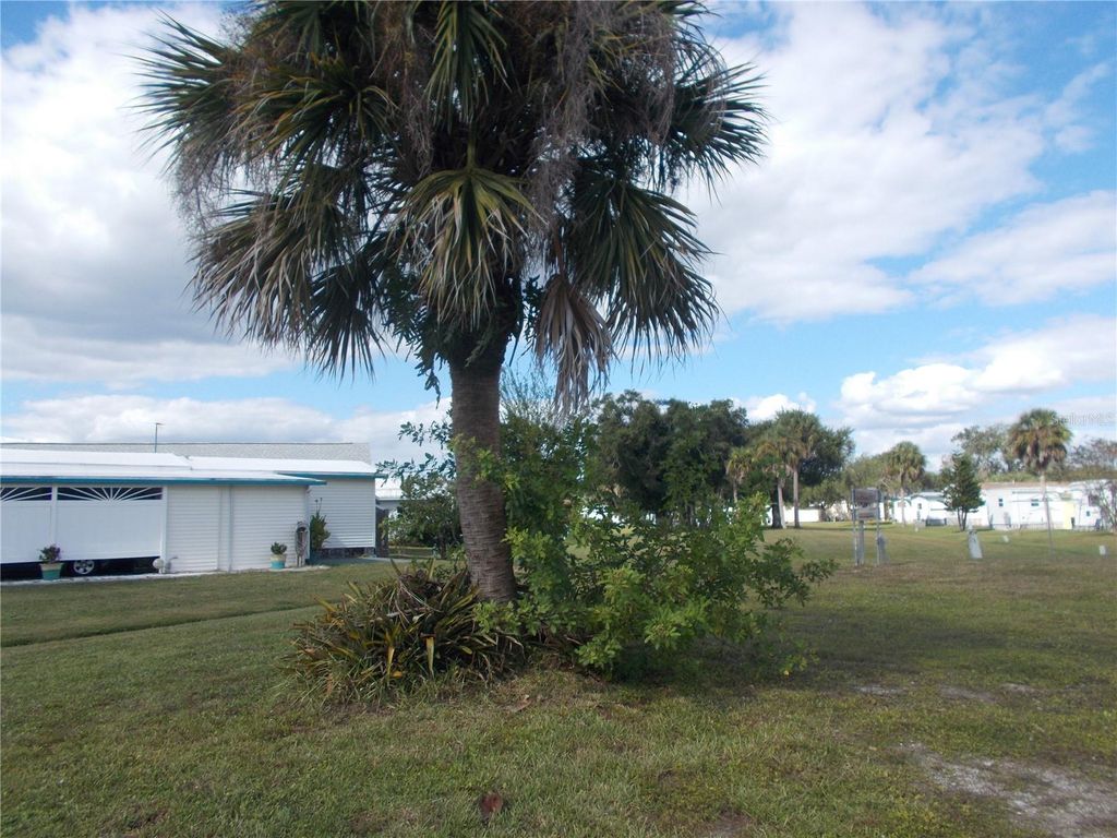 Photo of 5751 Holiday Park Boulevard, North Port, FL 34287 (MLS # C7516405)