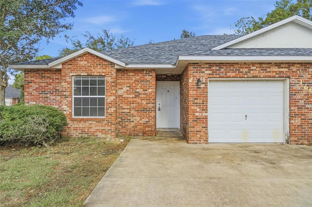 Photo of 166 Plain View Drive #A, Palm Coast, FL 32164 (MLS # FC316042)